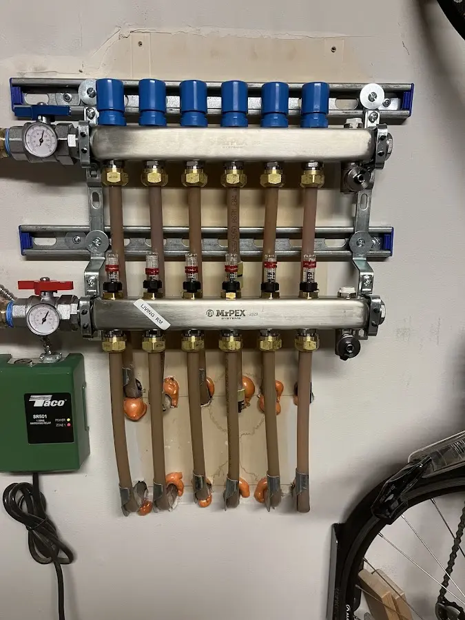 Plumber performing Leak Detection at a residential property in Acton